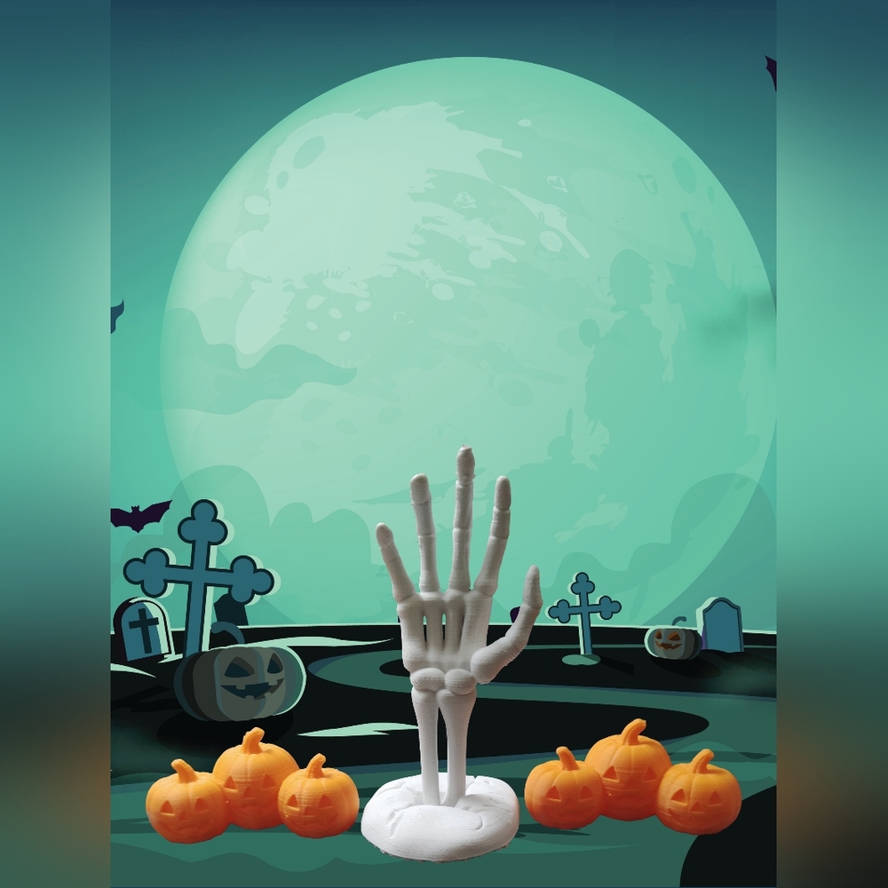 3D Printed Skeleton Hand With Two Pumpkin Patches